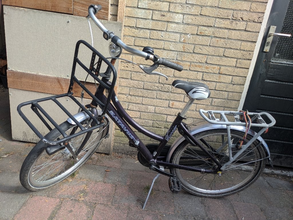 Gebruikte meisjes fiets met voordrager, Ophalen, Velgrem, Batavus®, Handrem