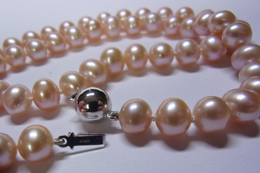 Nieuw Parelcollier met 14 karaat witgouden slot, Verzenden, Nieuw, Met edelsteen, Goud