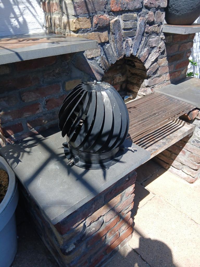 Zwarte dakventilator/afzuiger, Ophalen