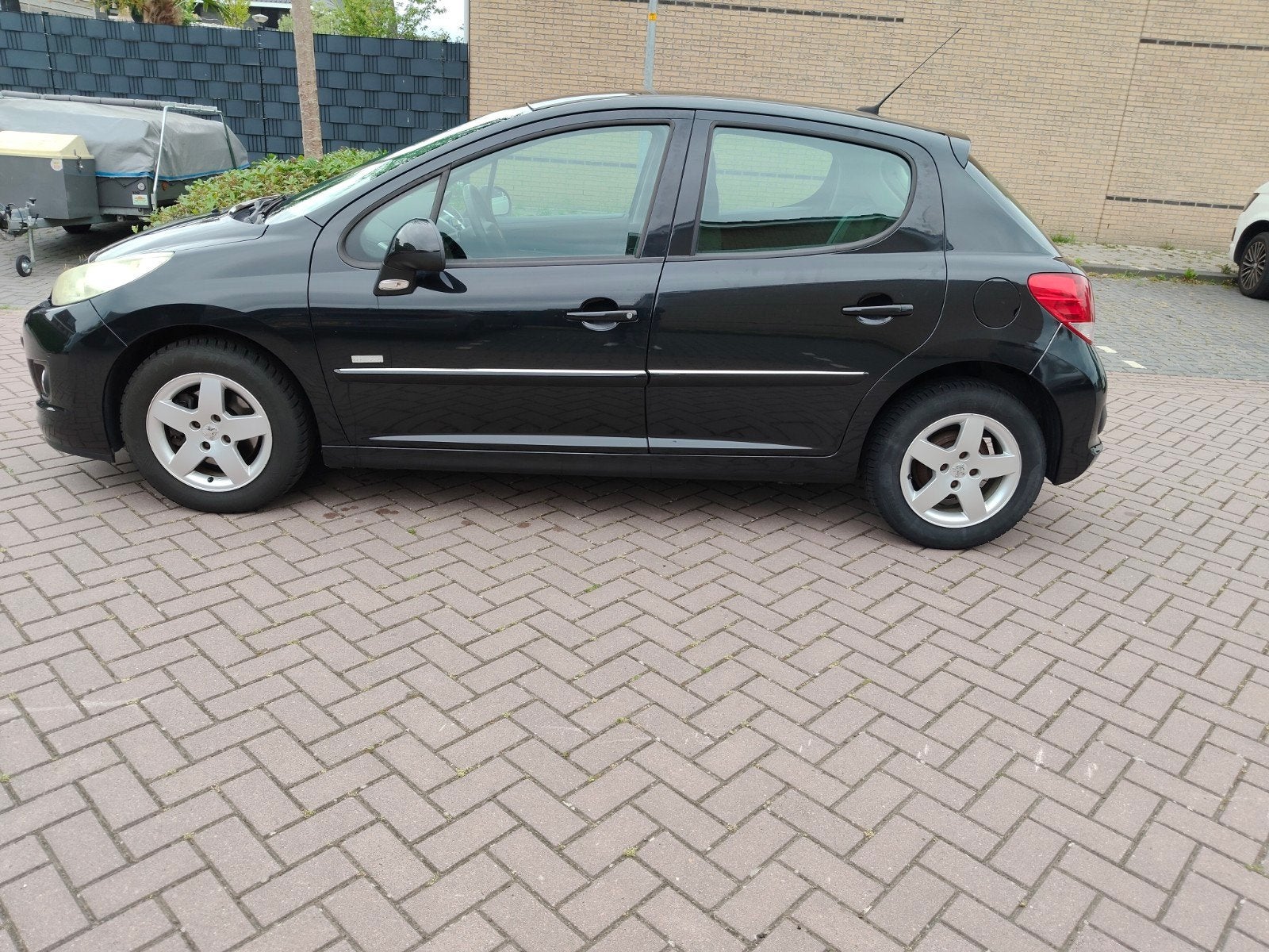 Peugeot 207 1.4 VTI 16V 5DRS 2011 Zwart, Auto's, Voorwielaandrijving, Stof, 1064 kg, Origineel Nederlands