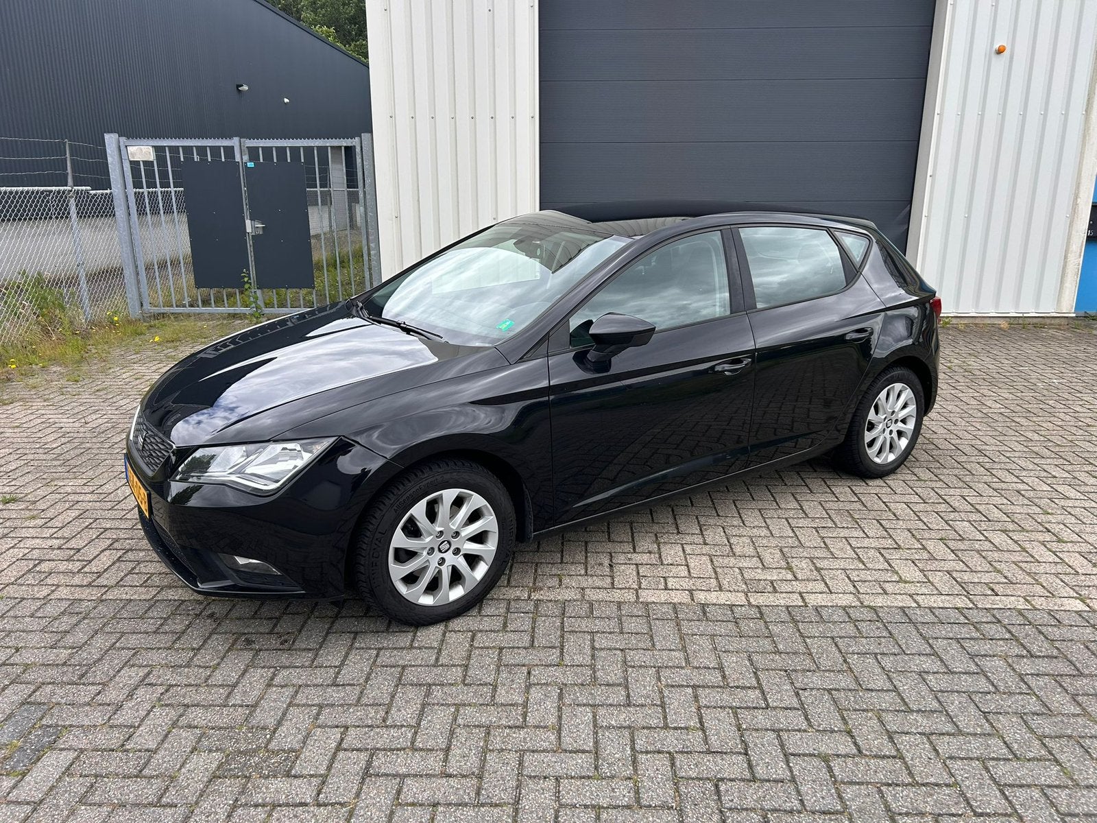 Seat Leon 1.2 TSI 77KW/105PK 2014 Zwart 126.000 km, Auto's, Seat, Voorwielaandrijving, Euro 5, Stof, Zwart