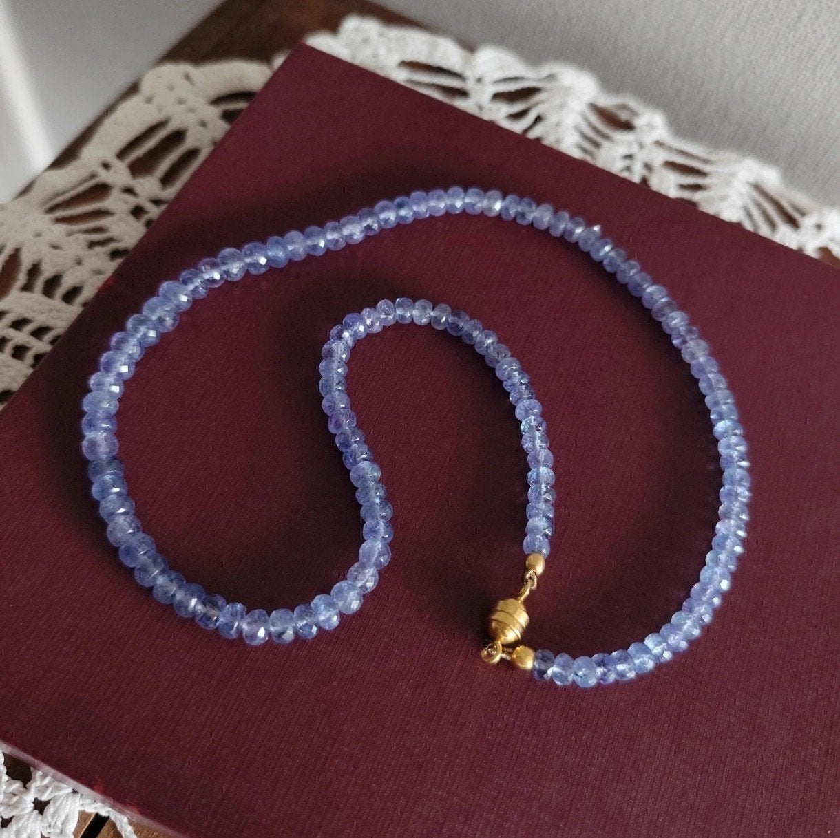 14 karaat slot tanzaniet ketting, Ophalen of Verzenden, Zo goed als nieuw, Met edelsteen, Goud