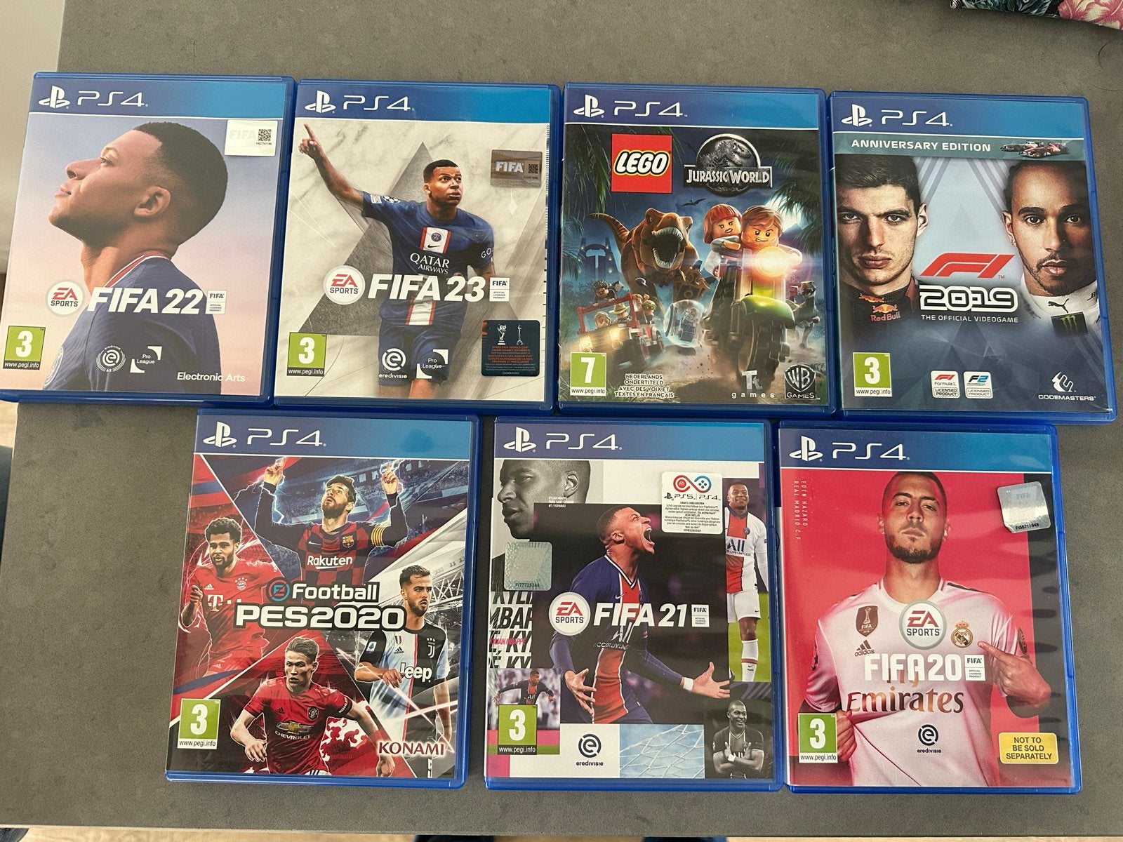 Diverse PS4 spellenp: FIFA, PES, F1 en LEGO Jurassic World, Ophalen, Gebruikt, Sport, Vanaf 3 jaar