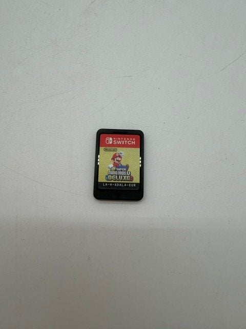 Nintendo Switch Game - Super Mario Bros Deluxe, Avontuur en Actie, Ophalen of Verzenden, Zo goed als nieuw, 3 spelers of meer