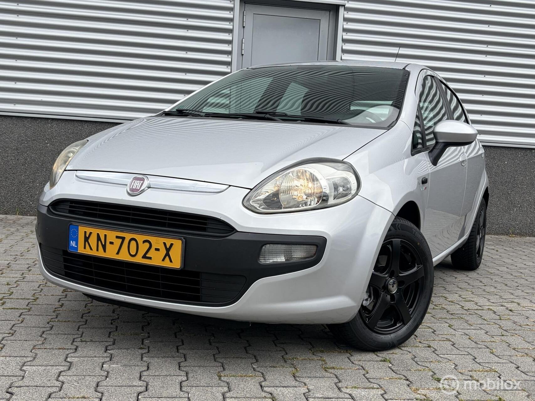 Fiat Punto Evo 1.4 Dynamic zeer nette auto!, Auto's, Fiat, Voorwielaandrijving, Euro 5, Stof, Zwart