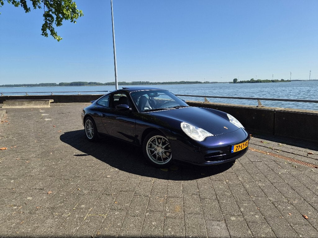 Porsche 911 (996.2) 3.6L Carrera 4, Auto's, Automaat, Zwart, Origineel Nederlands, 3596 cc