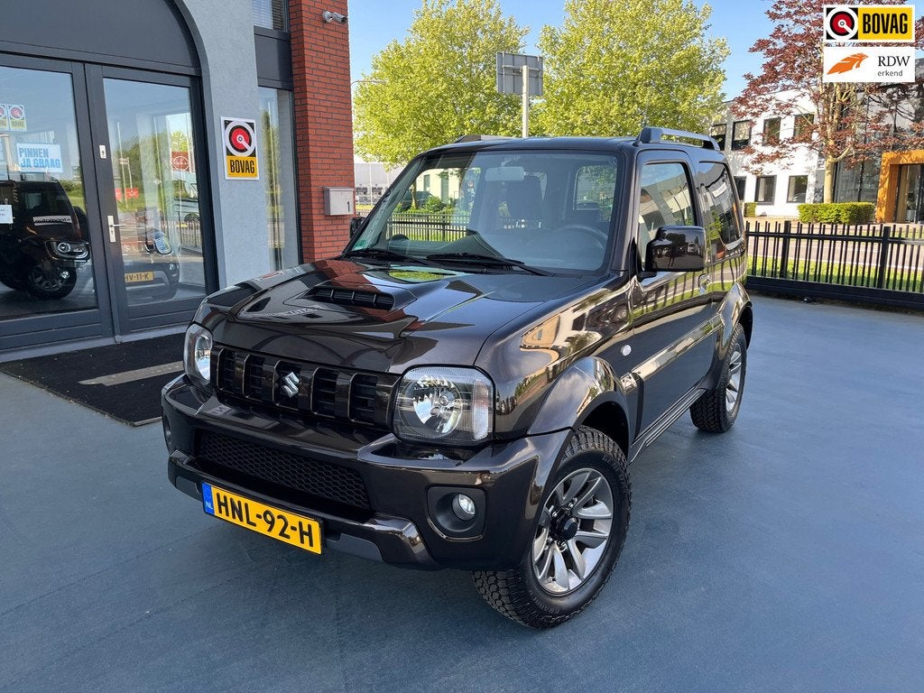 Suzuki JIMNY 1.3 Exclusive LEDER STOELVERWARMING AIRCO LMV, Auto's, Suzuki, Stoelverwarming, Gebruikt, Euro 6, Bruin