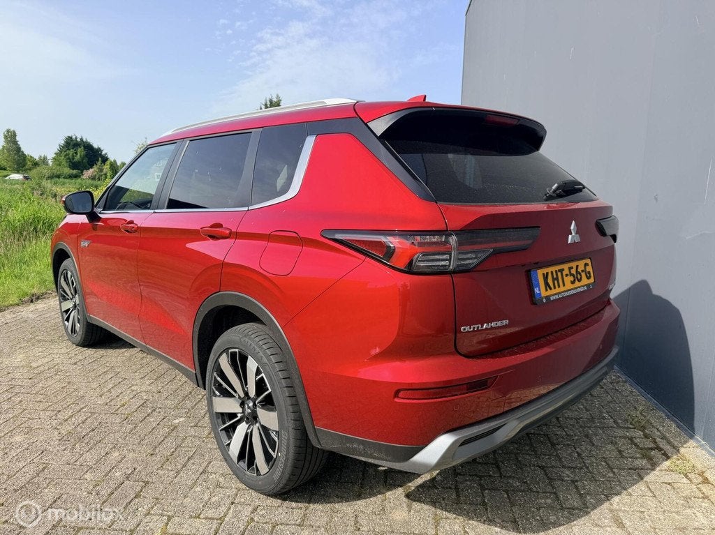 Mitsubishi Outlander 2.4 PHEV First Edition, Auto's, Automaat, 12 maanden, 4 cilinders, Bedrijf