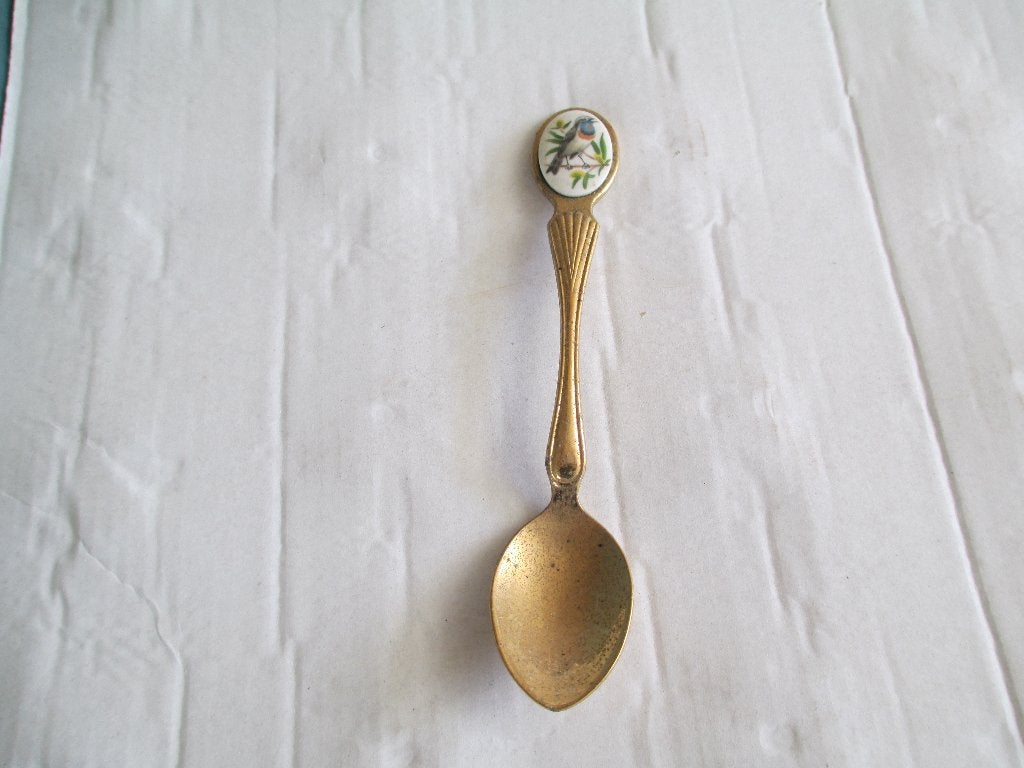 goudkleurige lepel met emaille vogel, Ophalen of Verzenden, Gebruikt, Rvs of Chroom