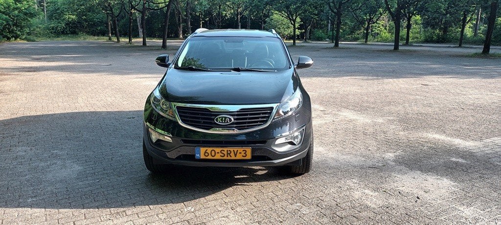 Kia Sportage 2.0 X-clusive automaat, Auto's, Zwart, 4 cilinders, 75 €/maand, Particulier