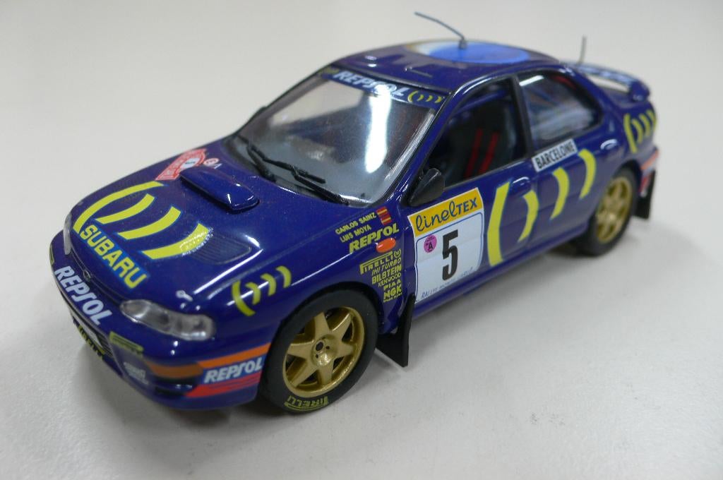 subaru impreza 555 -ixo models  1/43, Hobby en Vrije tijd, Modelauto's | 1:43, Nieuw, Auto, Overige merken, Verzenden