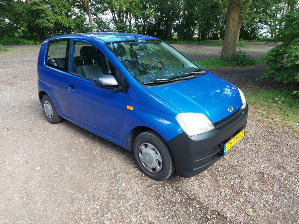 Daihatsu Cuore 1.0 Osaka 3D 2006 Blauw, Auto's, Daihatsu, Voorwielaandrijving, Stof, 600 kg, Zwart