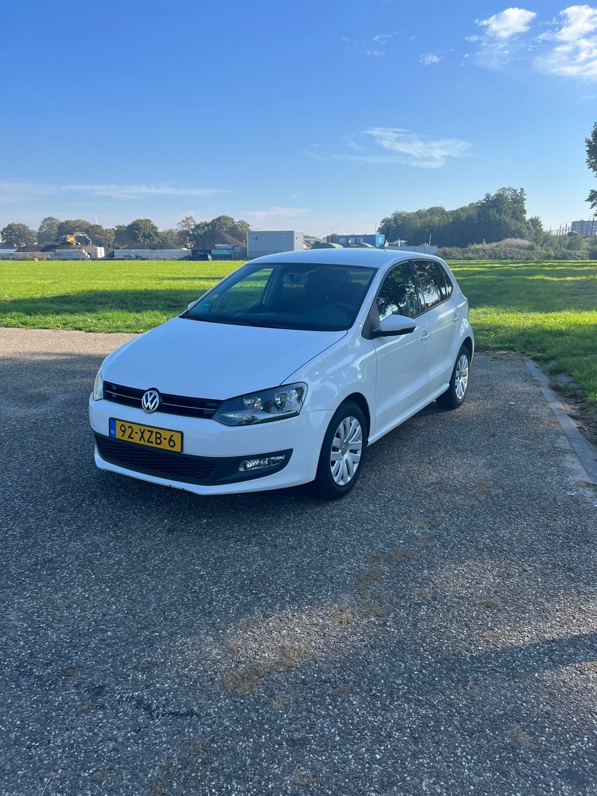 Volkswagen Polo 1.6 TDI 66KW 2012 Wit, Auto's, Voorwielaandrijving, Stof, Verwarmde buitenspiegels, Zwart