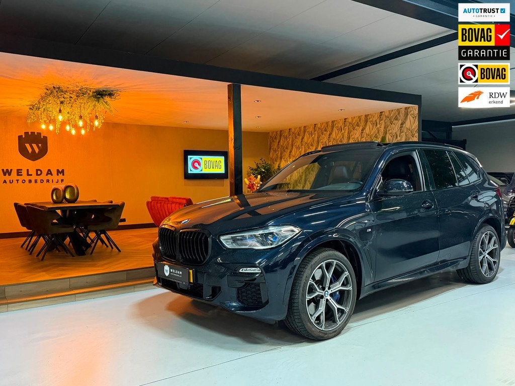 BMW X5 BMW X5 xDrive45e High Executive | M-Pakket | Plug-in, Auto's, BMW, Gebruikt, Met garantie (alle), Blauw, Vierwielaandrijving