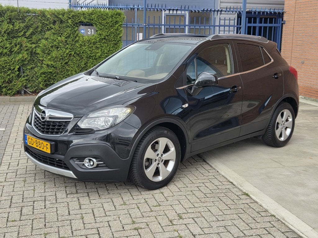 Opel Mokka 1.4 T Cosmo Leder 1e eigenaar (bj 2015), Auto's, Keurmerk '100% Onderhouden', Gebruikt, Euro 6, Zwart