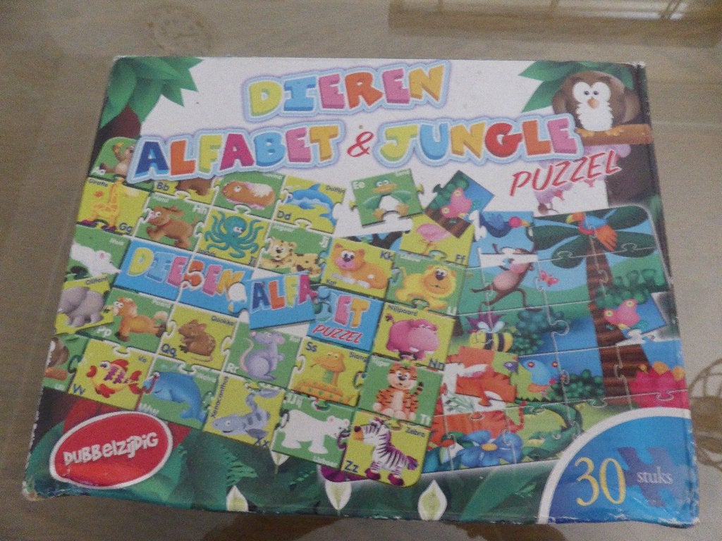 dieren puzzel dubbelzijdig alfabet & jungle puzzel, Ophalen of Verzenden, Meer dan 50 stukjes, Gebruikt, 6 jaar of ouder