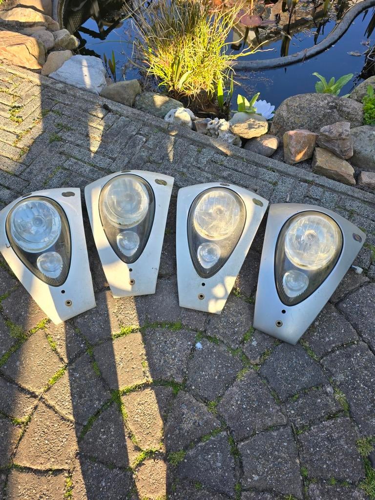 Sym mio koplampen met voorkap, Ophalen of Verzenden