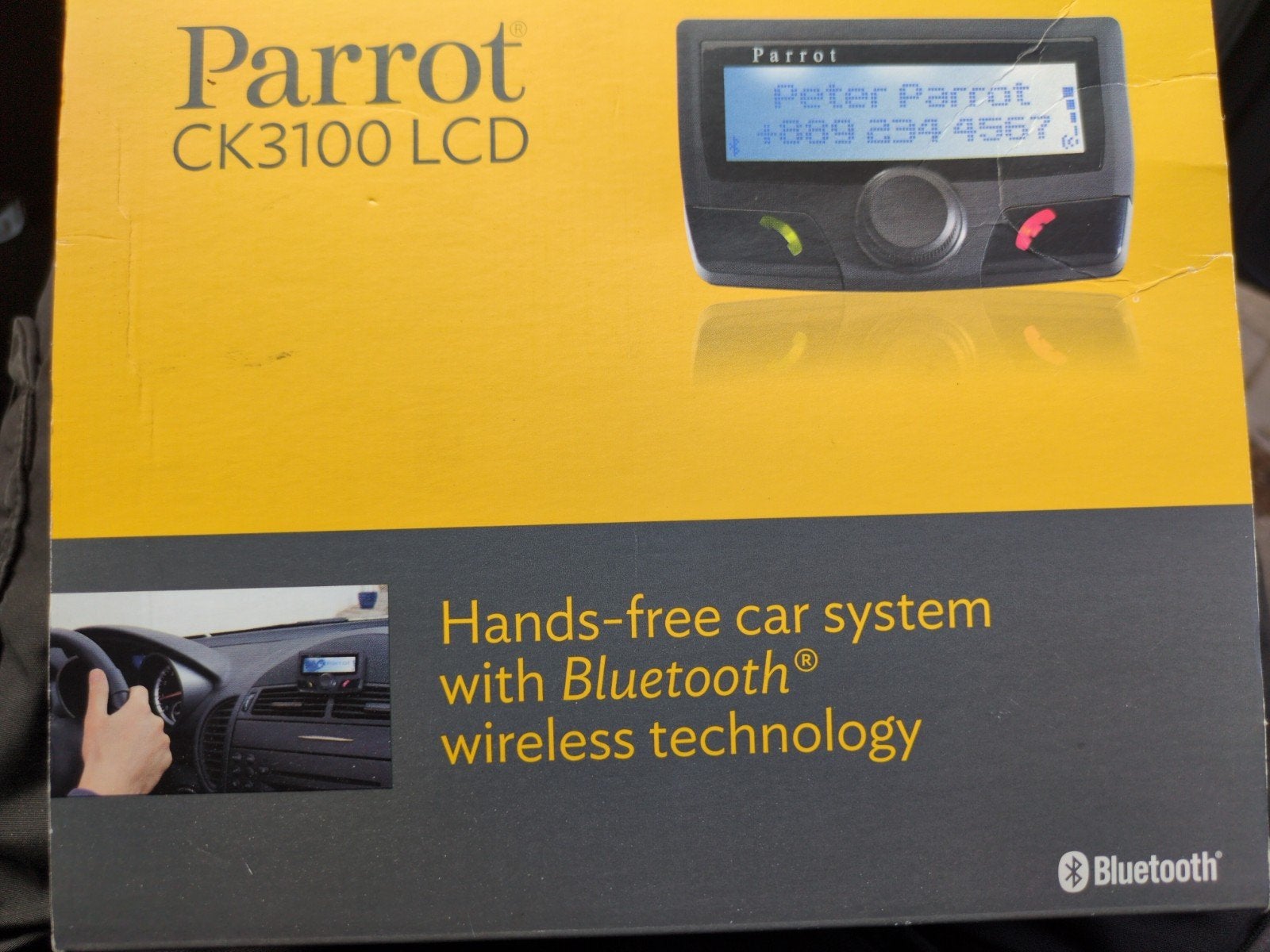 Parrot CK3100 LCD Bluetooth Carkit met ISO Quadlock Adapter, Auto diversen, Carkits, Ophalen of Verzenden, Zo goed als nieuw