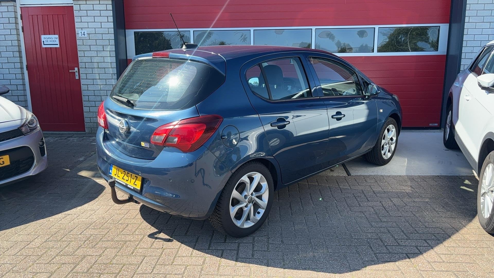 Opel Corsa 1.4 Edition TREKHAAK / CARPLAY / CAMERA / PDC / B, Voorwielaandrijving, Gebruikt, 4 cilinders, Blauw