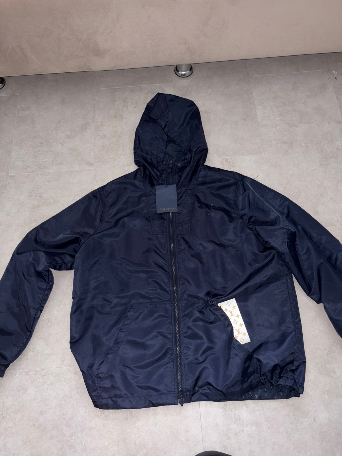 Lv reversible jas, Ophalen of Verzenden, Zo goed als nieuw, Regenjas