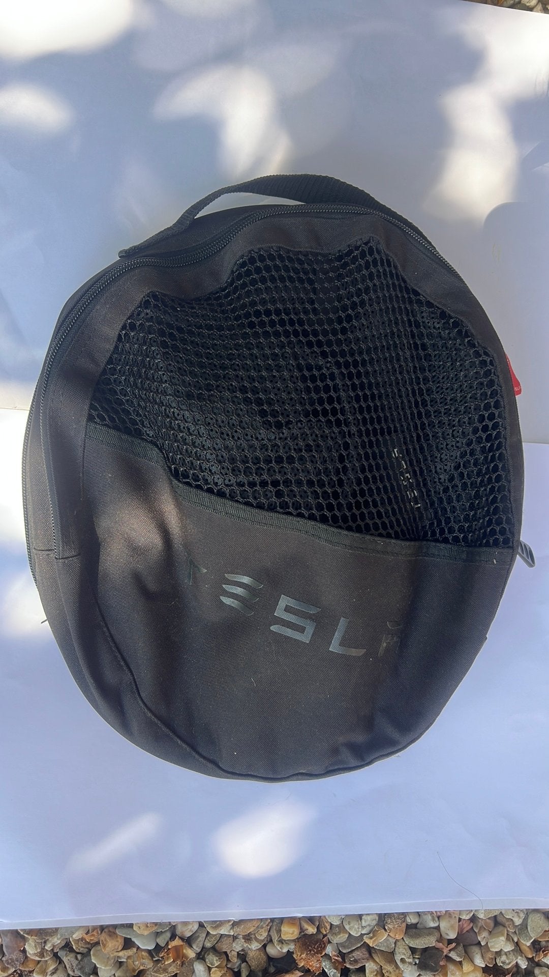 tesla x zonnescherm dak, Ophalen