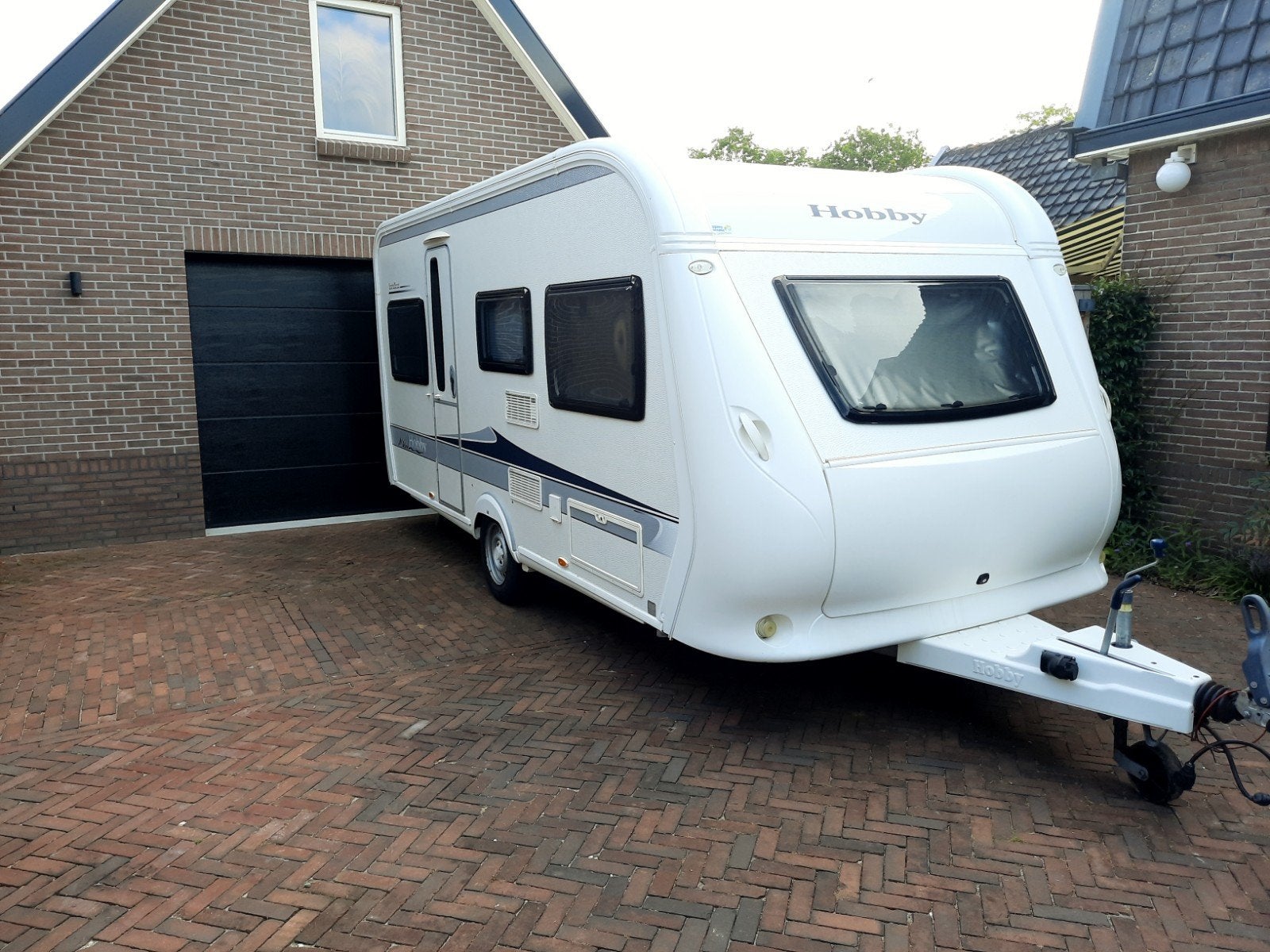 Hobby 455 UF Excellent caravan  2011, Caravans en Kamperen, Caravans, Rondzit, Hobby, Ringverwarming, Dwarsbed