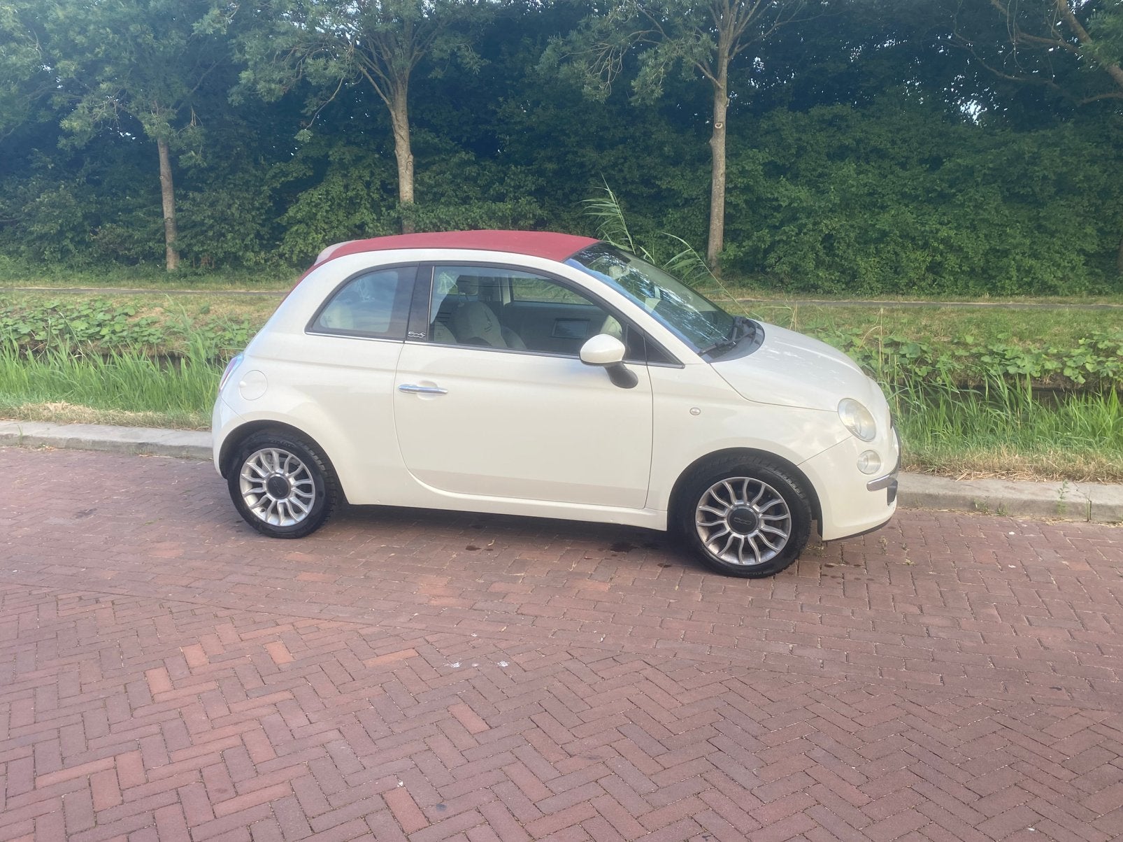 Fiat 500C 1.2 Lounge Cabriolet 2012 Wit met rode kap, Auto's, Fiat, 4 cilinders, Cabriolet, Leder en Stof, Wit