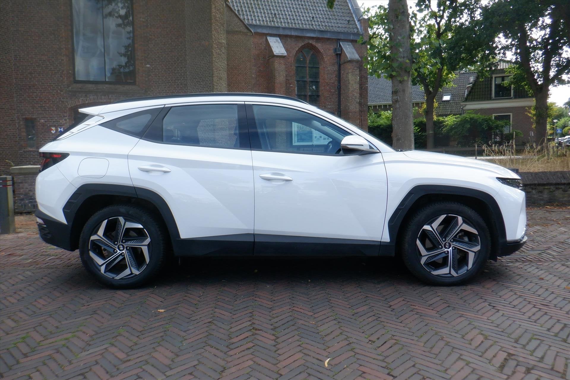 Hyundai Tucson 1.6 T-GDi PHEV 265pk AWD Aut Comfort Smart, Stof, Gebruikt, 4 cilinders, 179 pk