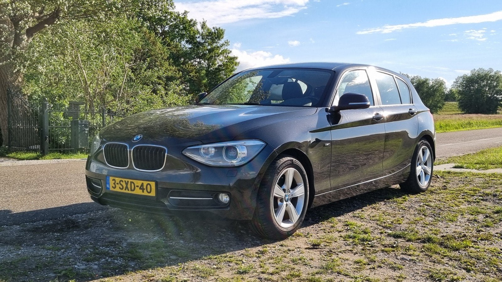 BMW 1-Serie 116I F20 100KW 5DR 2013 Zwart, Auto's, BMW, 1-Serie, Zwart, 4 cilinders, Zwart