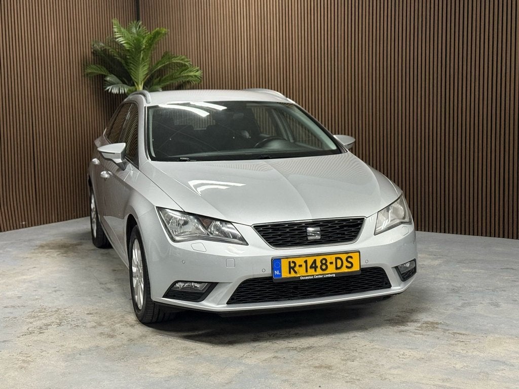 SEAT Leon ST 1.2 TSI Style (bj 2017, automaat), Auto's, Gebruikt, Euro 6, 4 cilinders, Automatische klimaatregeling