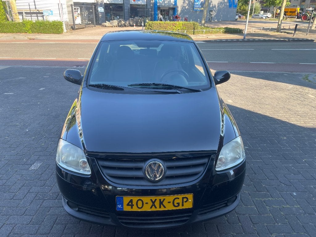 Volkswagen Fox 1.2 40KW 2007 Zwart, Auto's, Voorwielaandrijving, Stof, 4 stoelen, 1198 cc