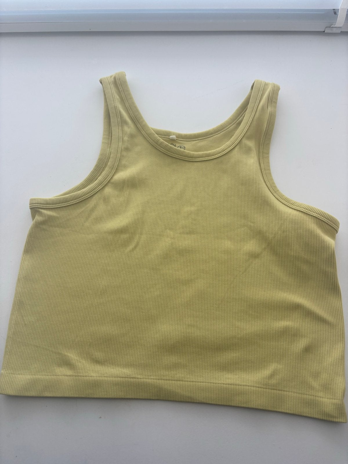 H&M Move geribbelde crop top, maat L, Geel, Maat 42/44 (L), Ophalen of Verzenden, Zo goed als nieuw