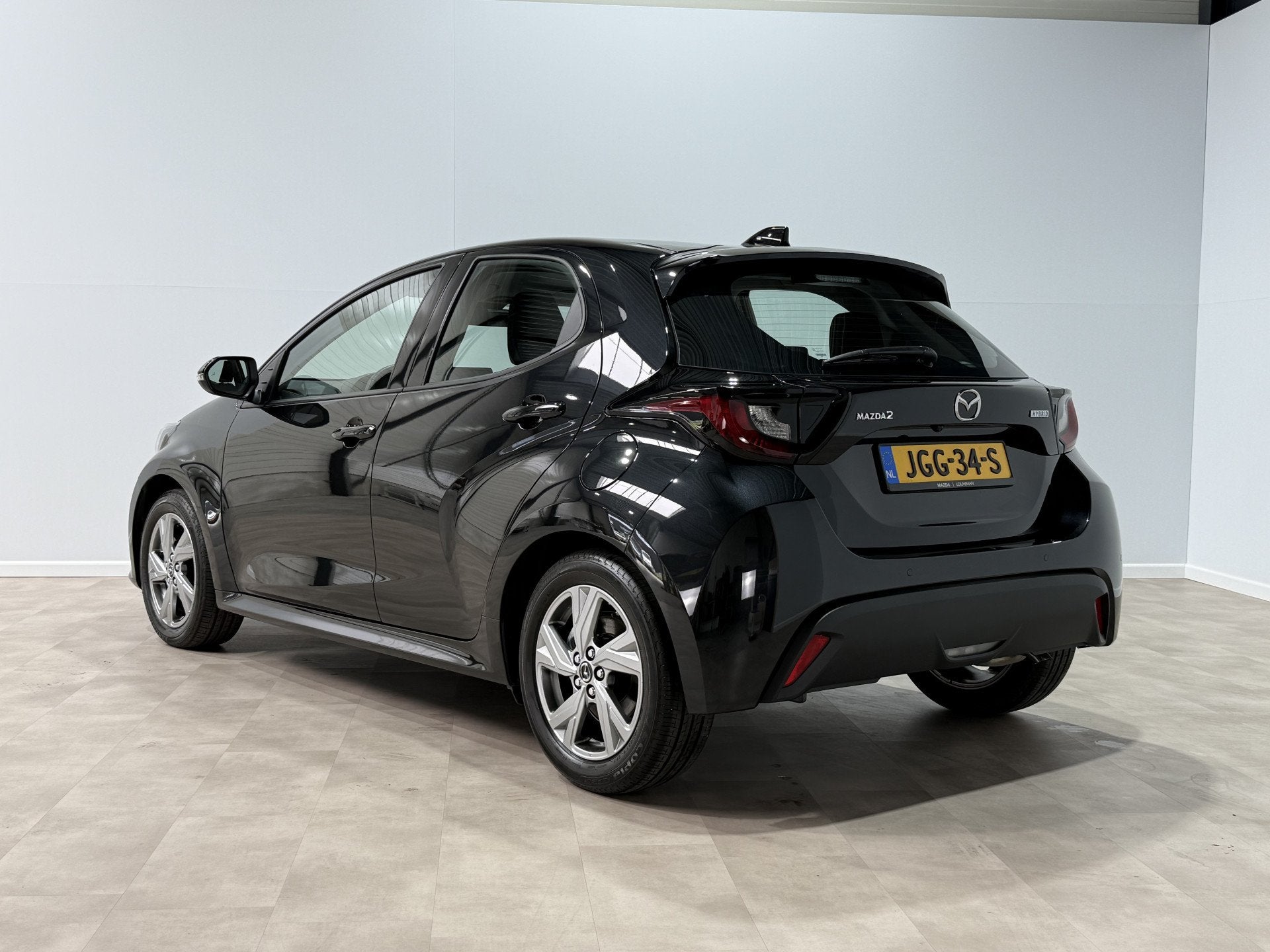 Mazda 2 Hybrid 1.5 Exclusive-line (bj 2025, automaat), Auto's, Mazda, 12 maanden, Gebruikt, Zwart, Bedrijf
