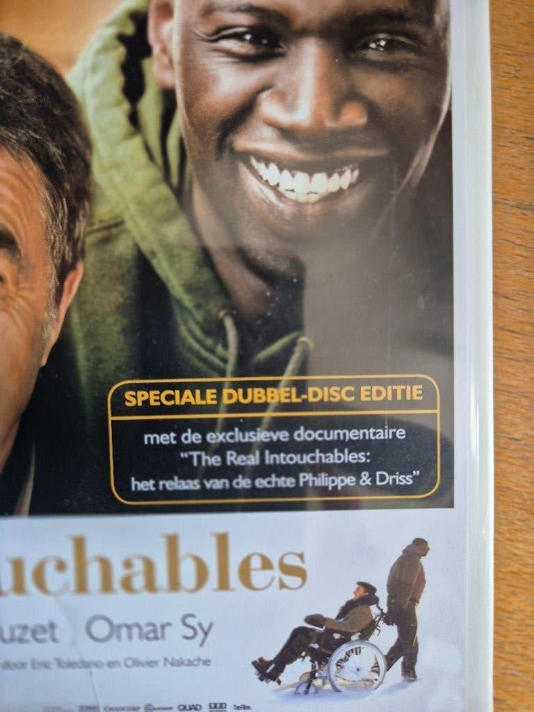 Intouchables DVD met bonus materiaal, Cd's en Dvd's, Vanaf 12 jaar, Ophalen of Verzenden, Zo goed als nieuw, Waargebeurd drama