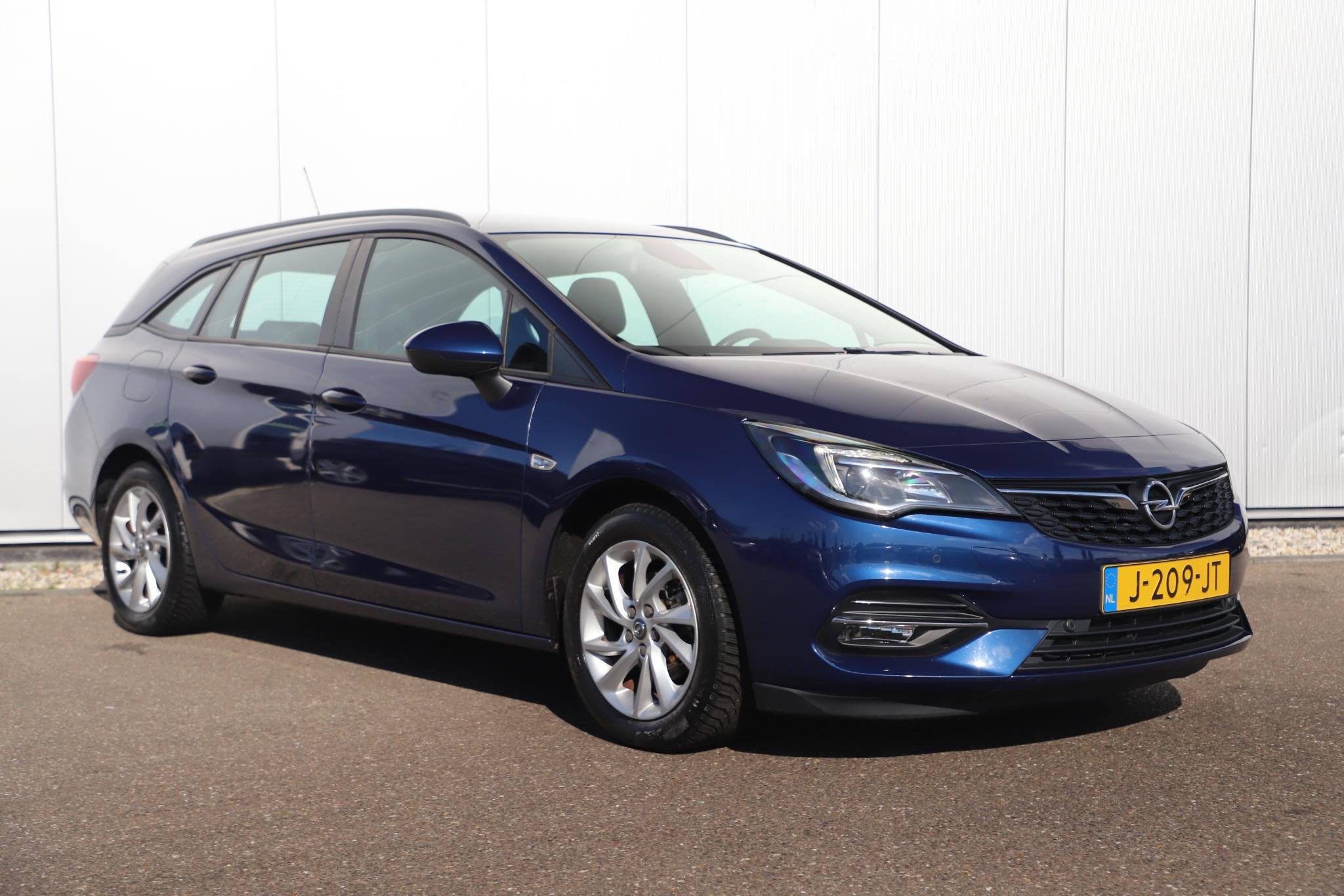 Opel Astra Sports Tourer 1.2 Business Edition 131PK Trekhaak, Voorwielaandrijving, Stof, 1199 cc, Met garantie (alle)