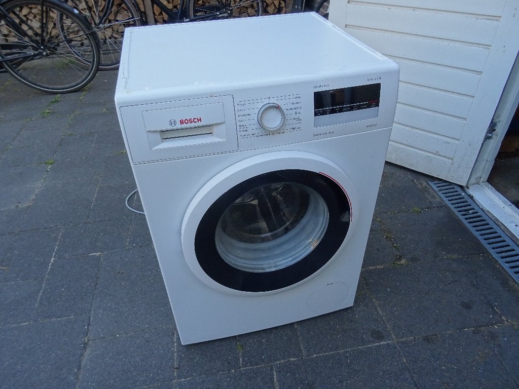 Wasmachine Bosch WAN28242 7kg 4 serie gat in plastic kuip, Witgoed en Apparatuur, Ophalen, Gebruikt, 85 tot 90 cm, 1200 tot 1600 toeren