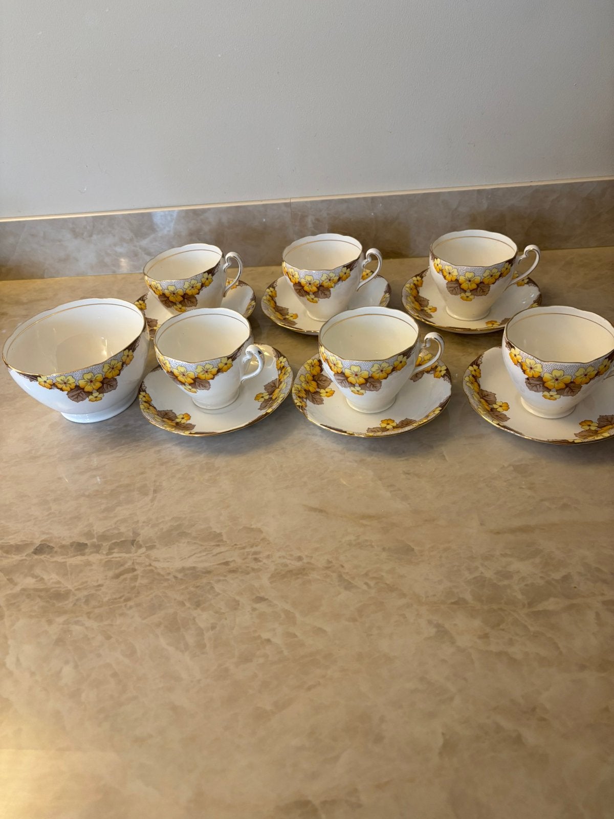 Koffiekopjes setjes, Ophalen