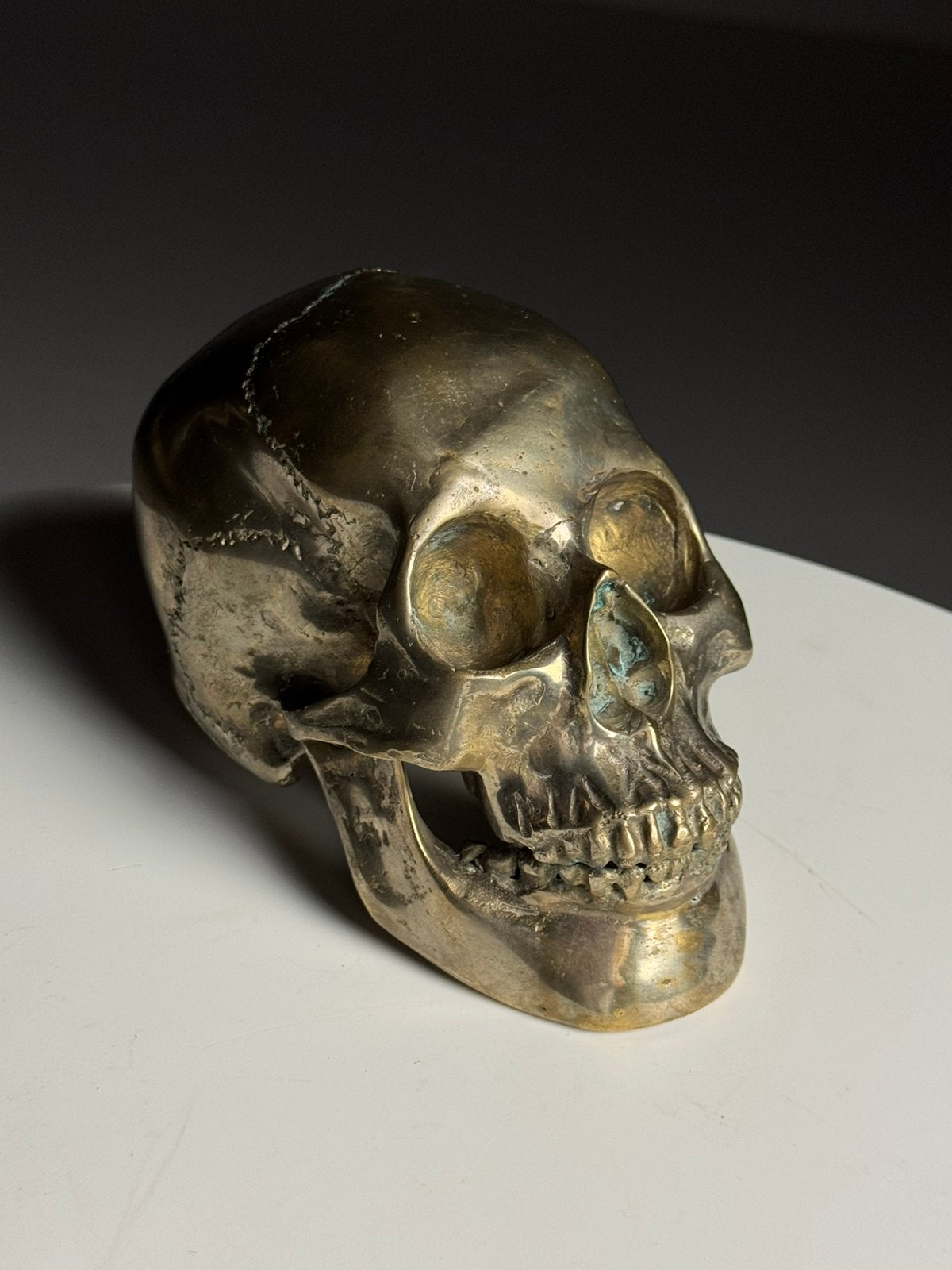Bronzen schedel memento mori 20e eeuw, Ophalen