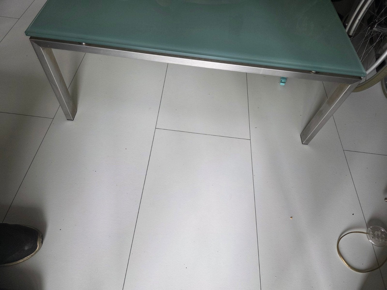 Glazen salontafel met RVS onderstel, Huis en Inrichting, Tafels | Salontafels, Ophalen, Gebruikt, 100 tot 150 cm, 50 tot 100 cm