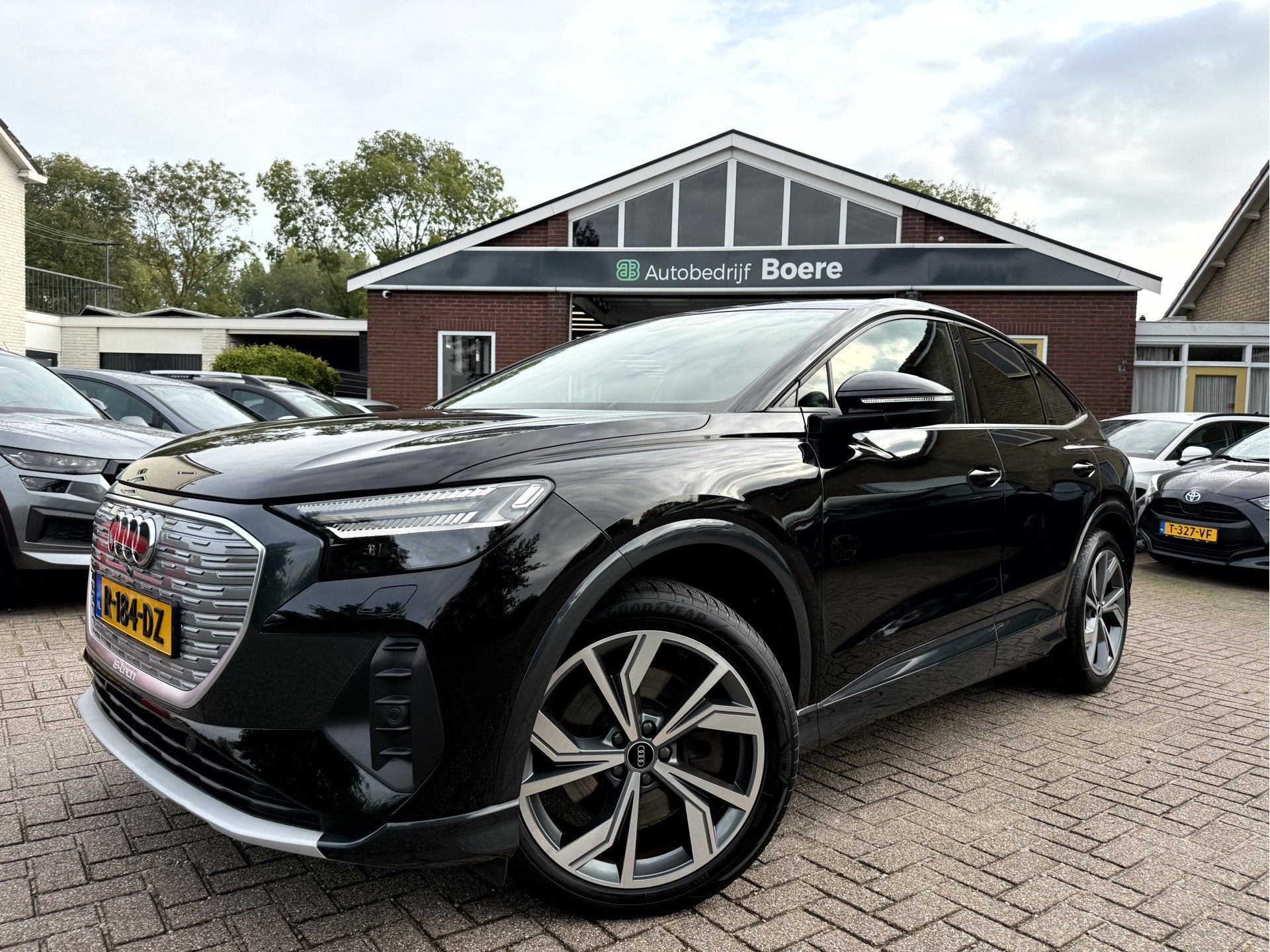 Audi Q4 Sportback e-tron 50 quattro 300pk Advanced edition 7, Auto's, Dealer onderhouden, Stof, Gebruikt, Zwart