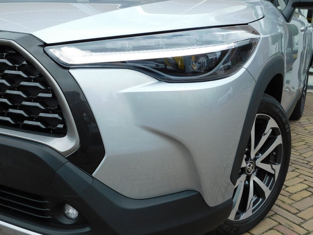 Toyota Corolla Cross Hybrid 140 Dynamic (bj 2024, automaat), Auto's, Toyota, 12 maanden, Stof, Gebruikt, 4 cilinders