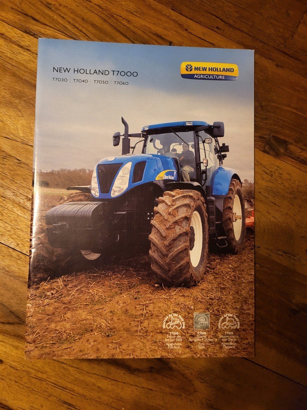 tractor folder New Holland T7000, Ophalen of Verzenden