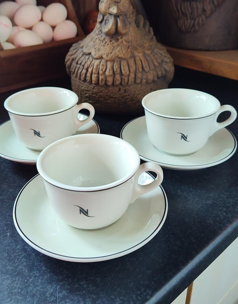 5x Nespresso cappuccino/Lungo kop en schotels, Ophalen of Verzenden, Zo goed als nieuw, Porselein, Kop en/of schotel