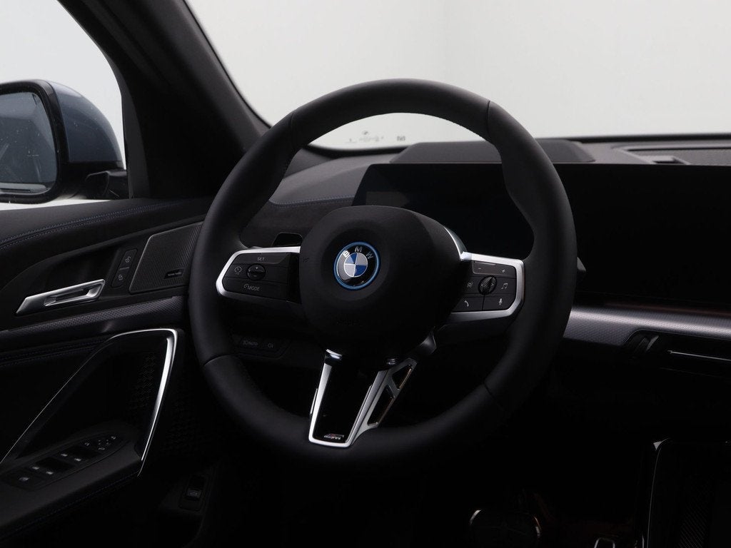 BMW iX2 eDrive20 67 kWh M Sport Edition (bj 2026, automaat), Auto's, BMW, IX2, Met garantie (alle), 24 min, Automatische klimaatregeling