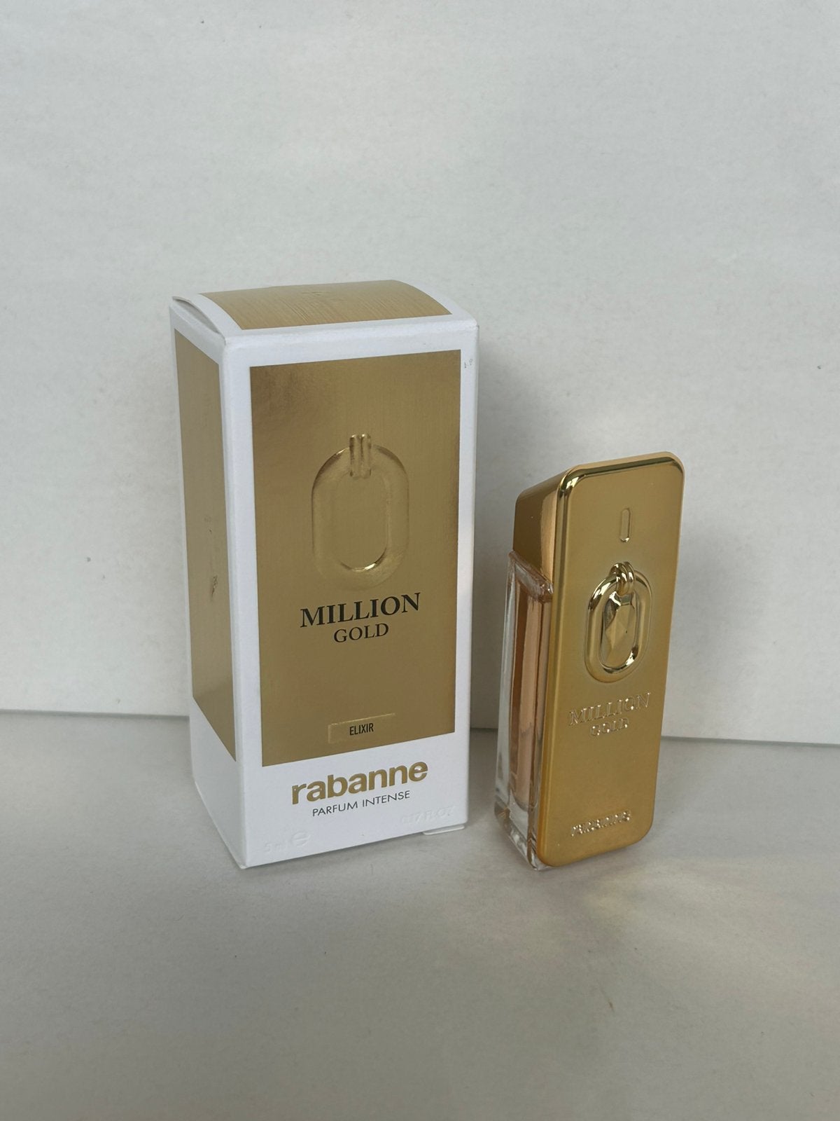Rabanne - million gold elixir miniatuur 5ml parfum intense, Sieraden, Tassen en Uiterlijk, Ophalen of Verzenden, Nieuw