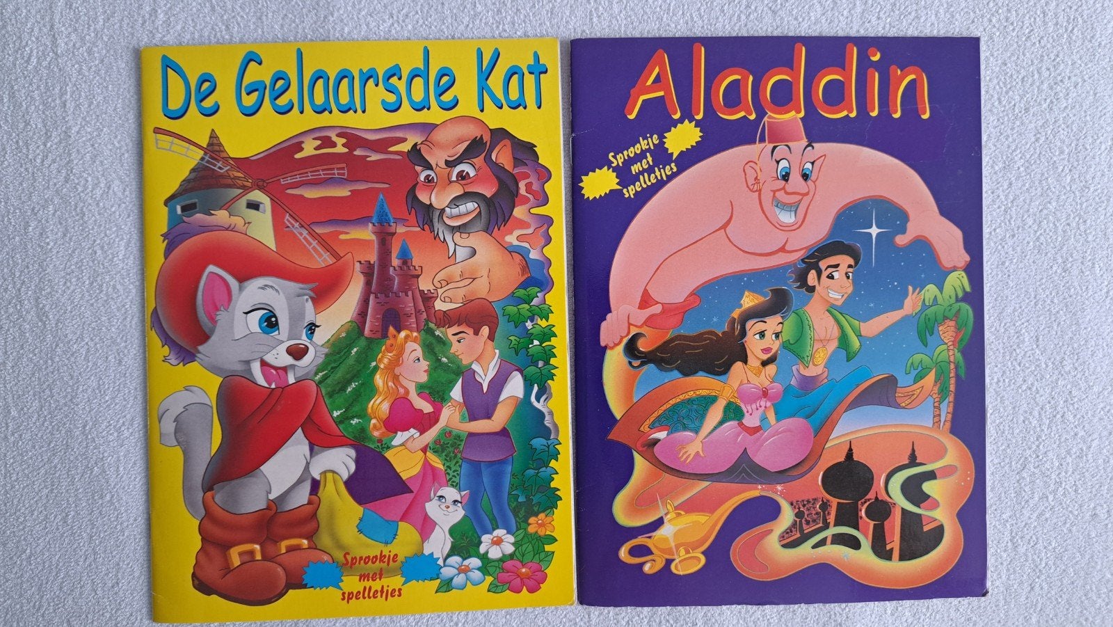 NIEUW: 2 sprookjes (De Gelaarsde Kat/Aladdin) met spelletjes, Jongen of Meisje, Nieuw, Ophalen of Verzenden, 4 jaar