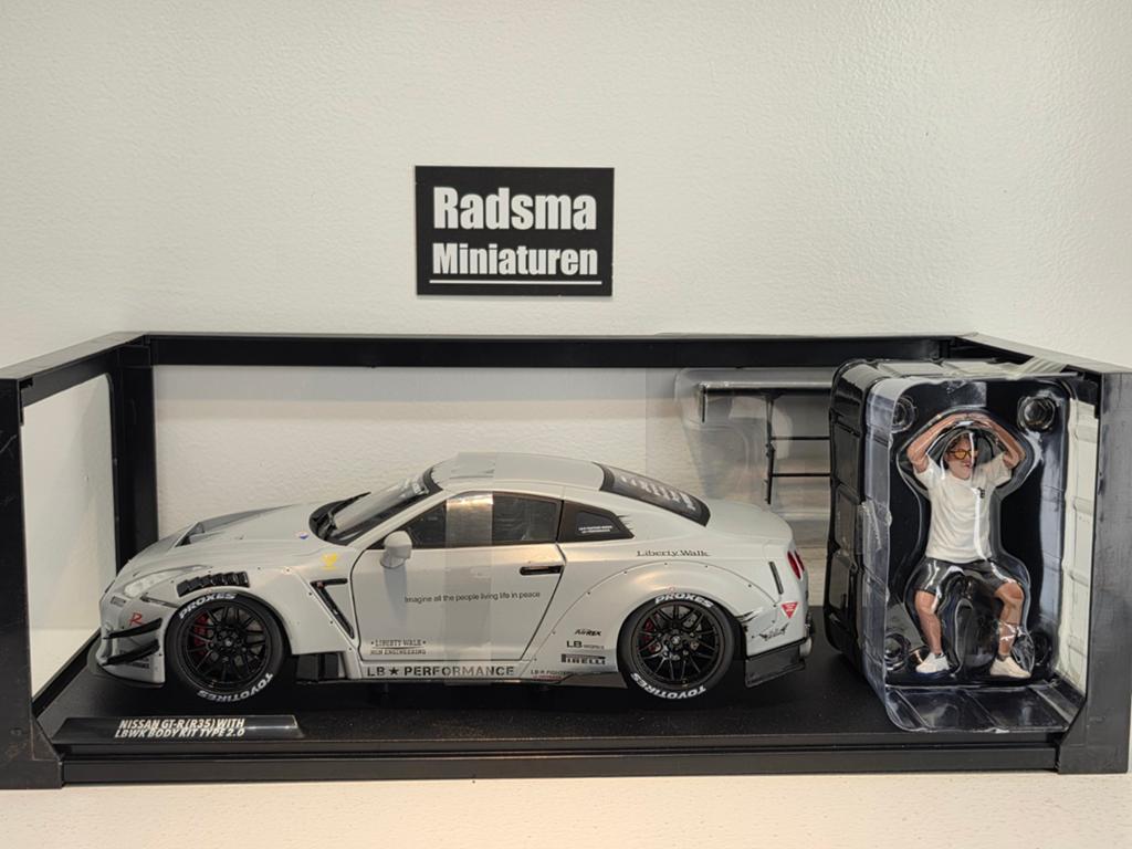 Nissan skyline GT-R R35 LWK + figuur 1:18 Solido, Hobby en Vrije tijd, Auto, Solido, Nieuw, Ophalen of Verzenden