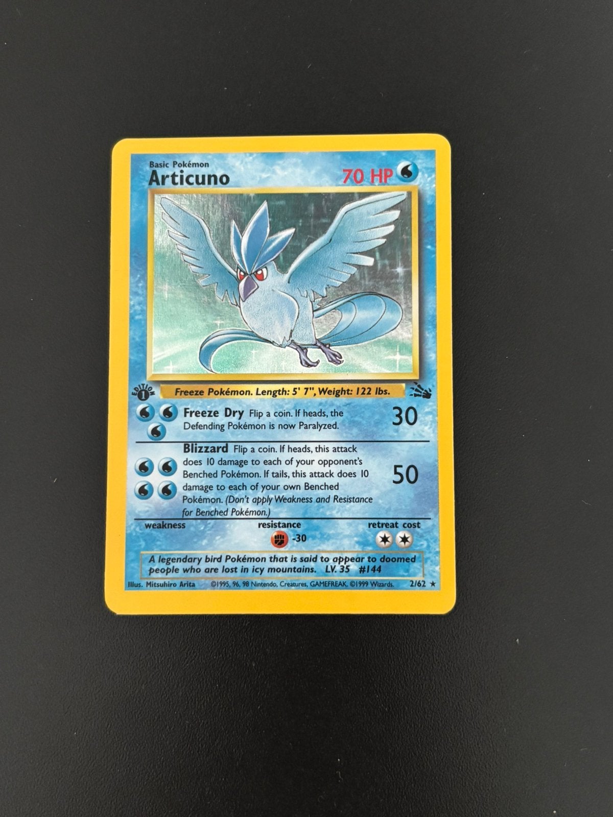 Articuno holo 2/62 1st edition fossil, Hobby en Vrije tijd, Verzamelkaartspellen | Pokémon, Ophalen of Verzenden, Zo goed als nieuw