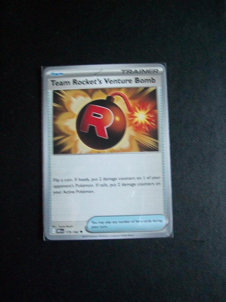 8423: Nieuwe Pokemon Kaart ROCKET's VENTURE BOMB (179/182), Verzenden, Nieuw, Losse kaart, Foil