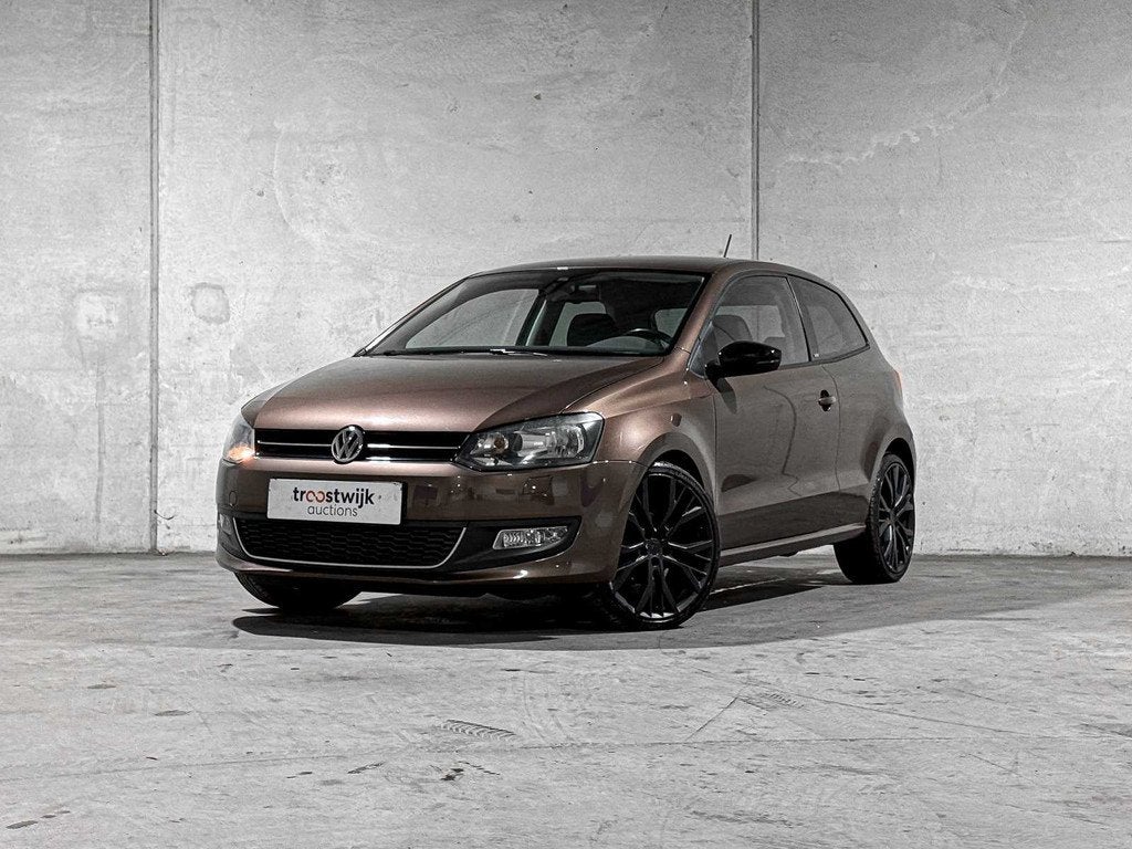 Volkswagen Polo 1.2-12V BlueMotion Comfortline 68pk 2011, SN, Auto's, Voorwielaandrijving, Euro 5, 967 kg, Bruin